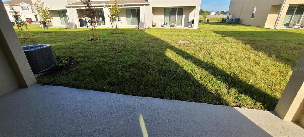 1310 Mako Way Kissimmee, FL 34741 - Photo 4 of 26 a view of a house with a yard