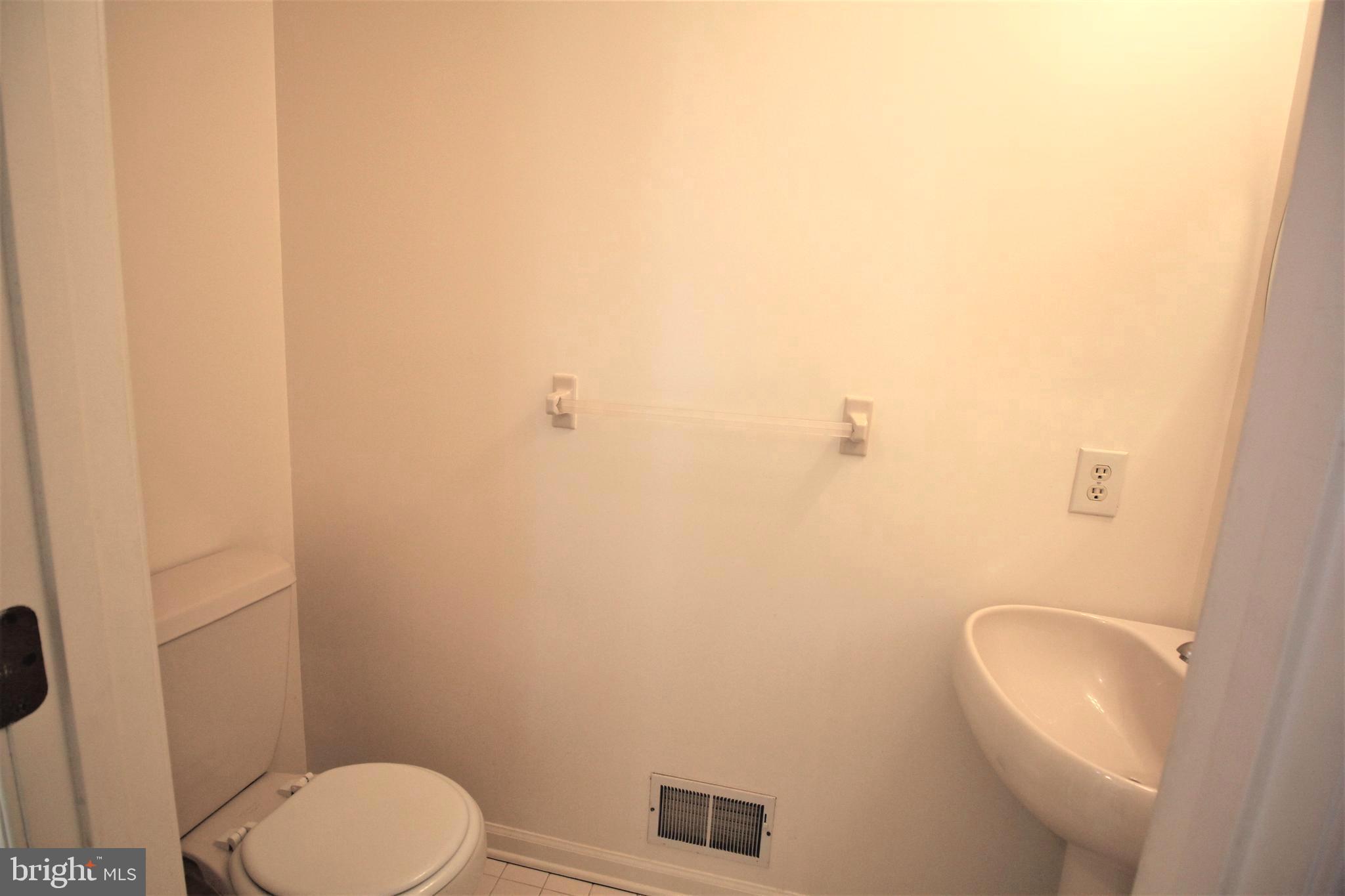 92 Harvard Circle Princeton, NJ 08540 - Photo 11 of 40 a bathroom with a toilet and a sink