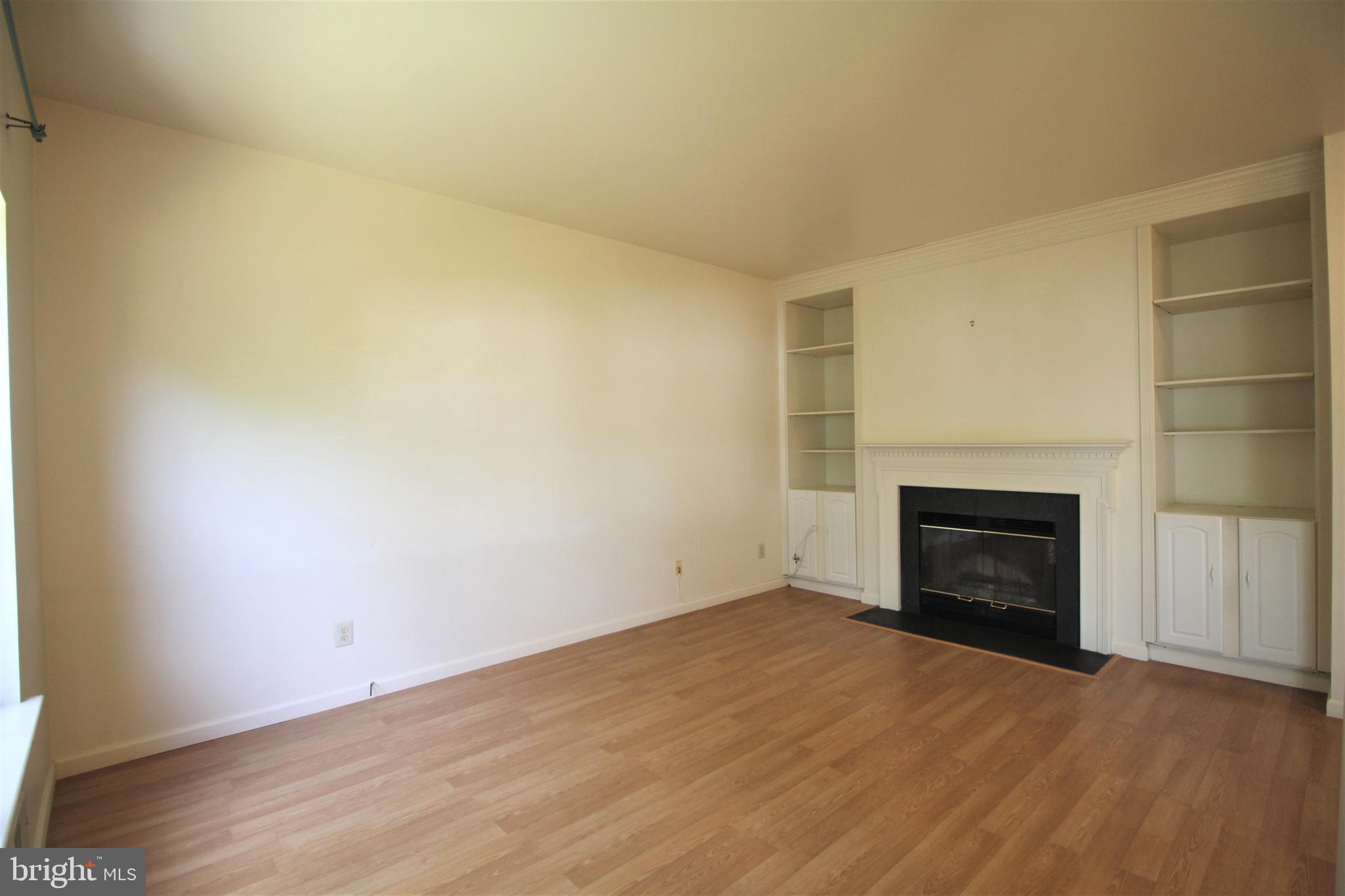 92 Harvard Circle Princeton, NJ 08540 - Photo 16 of 40 a view of empty room with a fireplace