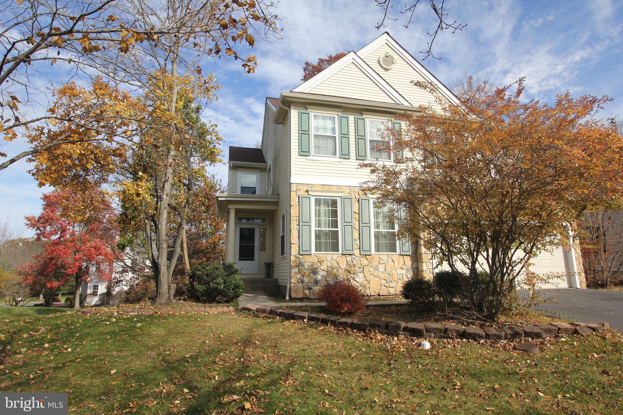 92 Harvard Circle Princeton, NJ 08540 - Photo 4 of 40 front view of a house with a yard