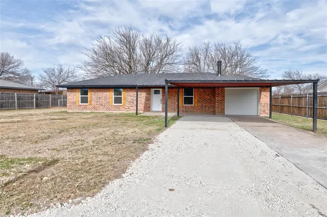 front view of house with a yard