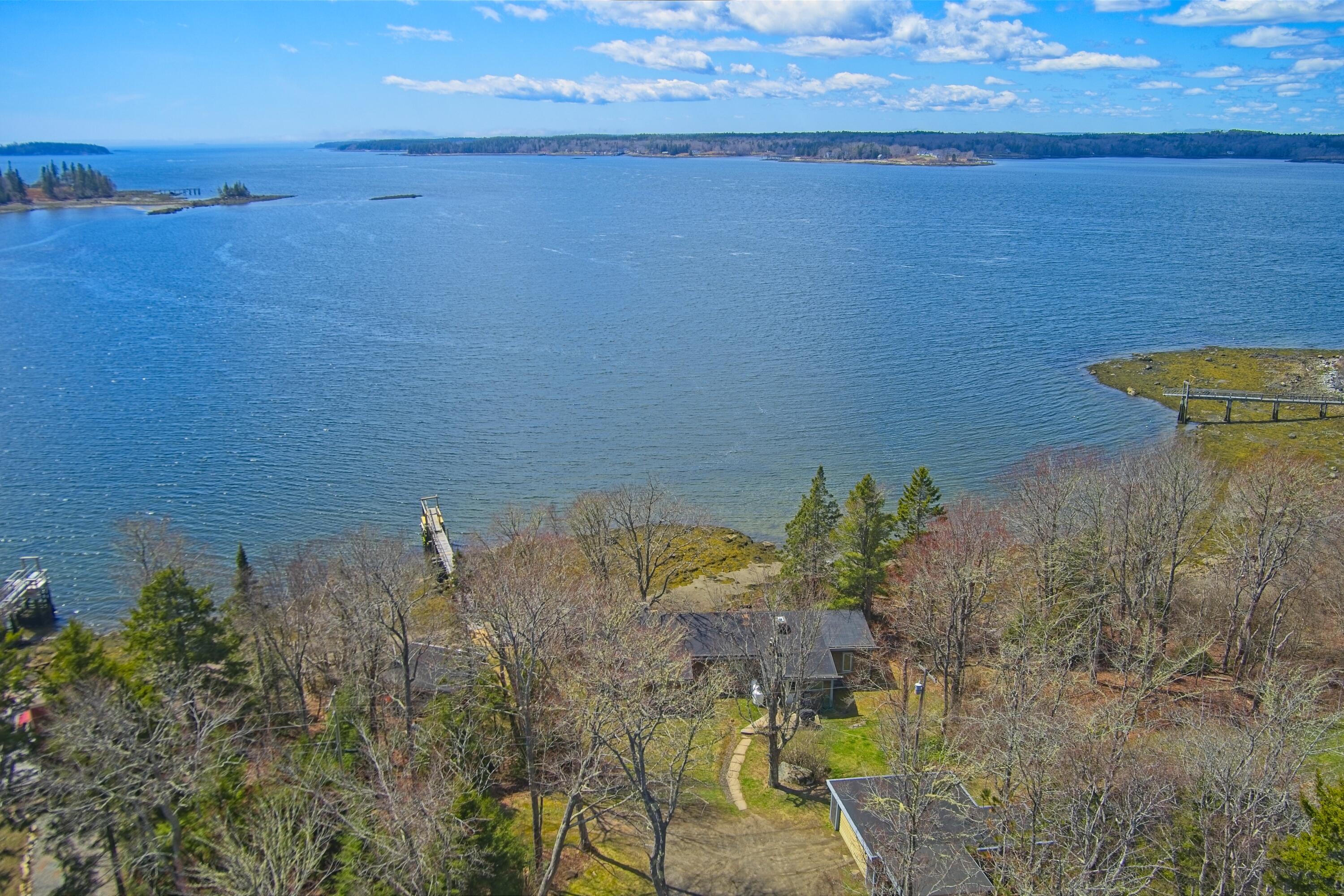 Aerial view of home and pier