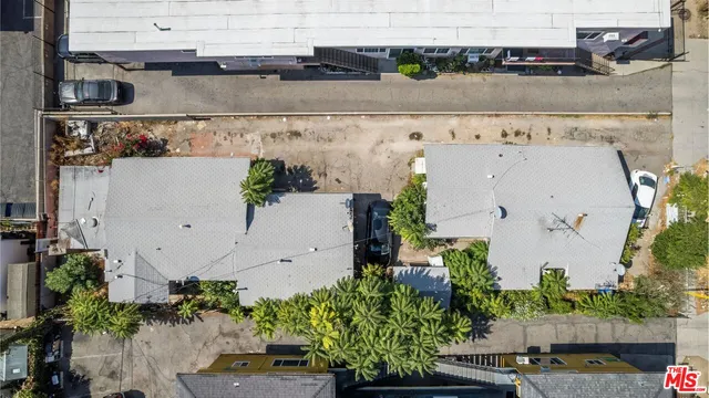 an aerial view of a houses with outdoor space