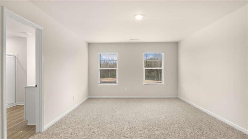 202 Cattle Drive Perry, GA 31069 - Photo 11 of 30 an empty room with windows