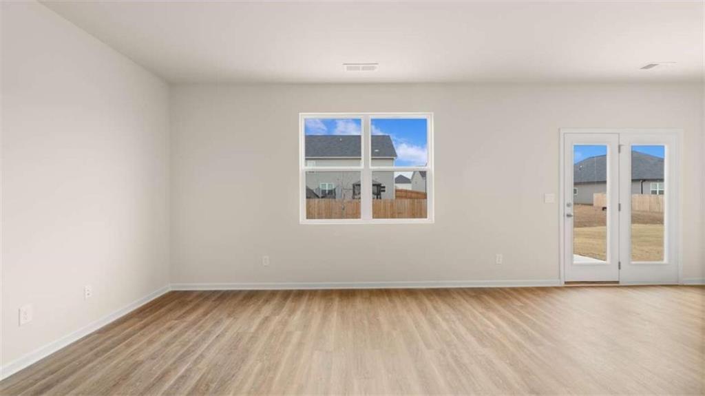 202 Cattle Drive Perry, GA 31069 - Photo 19 of 30 an empty room with a window