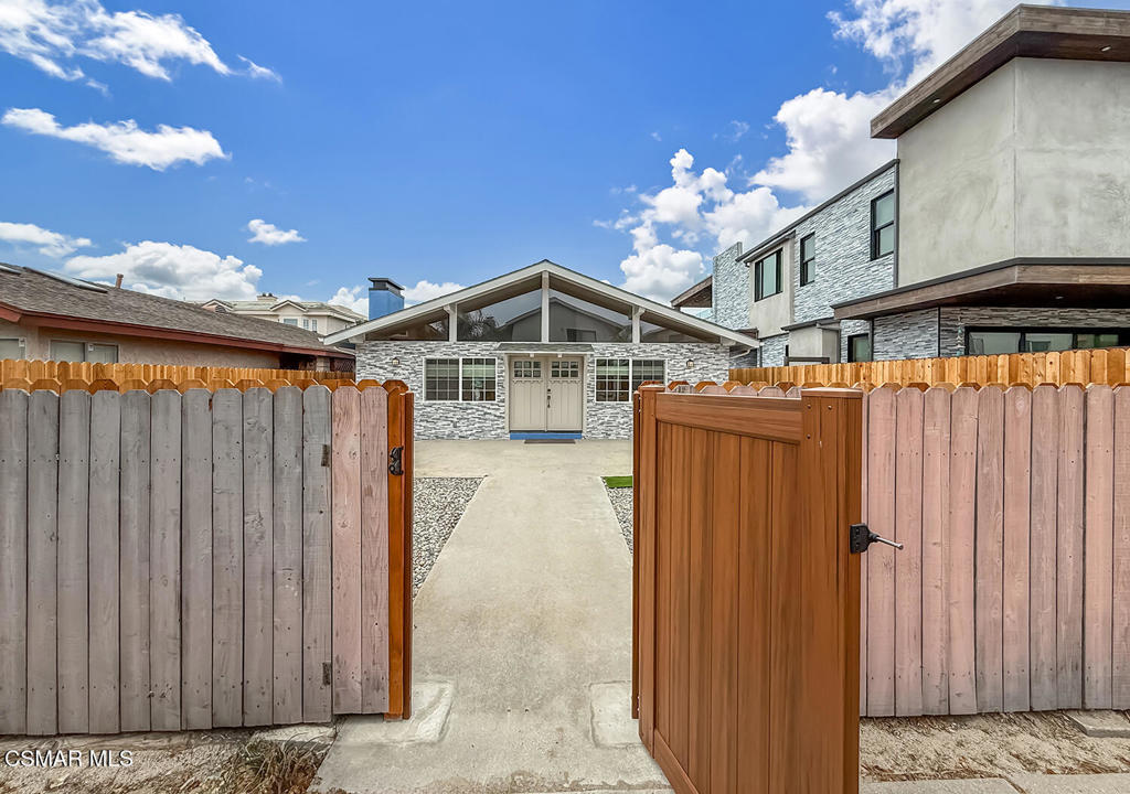 5040 Dolphin Way Oxnard, CA 93035 - Photo 2 of 26 a view of a house with a backyard