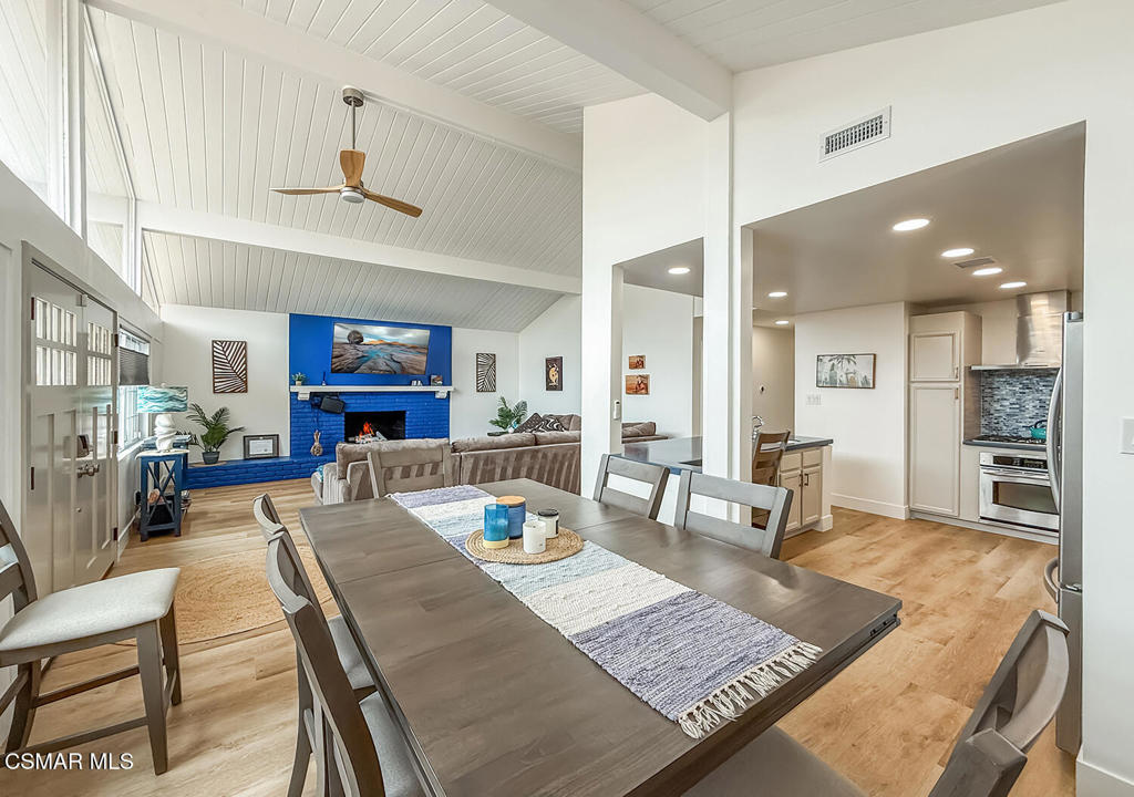 5040 Dolphin Way Oxnard, CA 93035 - Photo 9 of 26 a living room with furniture and kitchen view