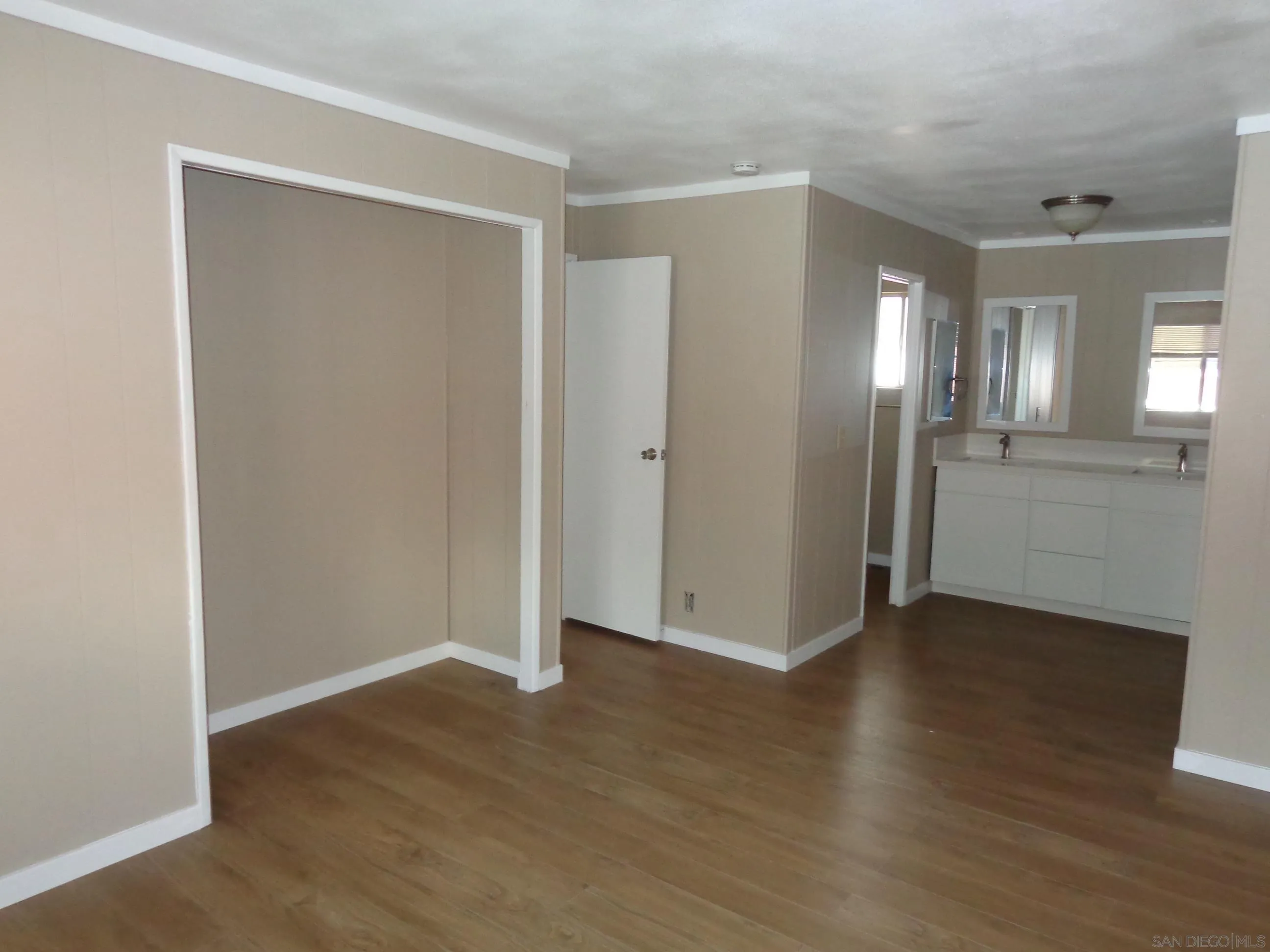 106 Havenview Lane Oceanside, CA 92056 - Photo 16 of 24 a view of a room with wooden floor
