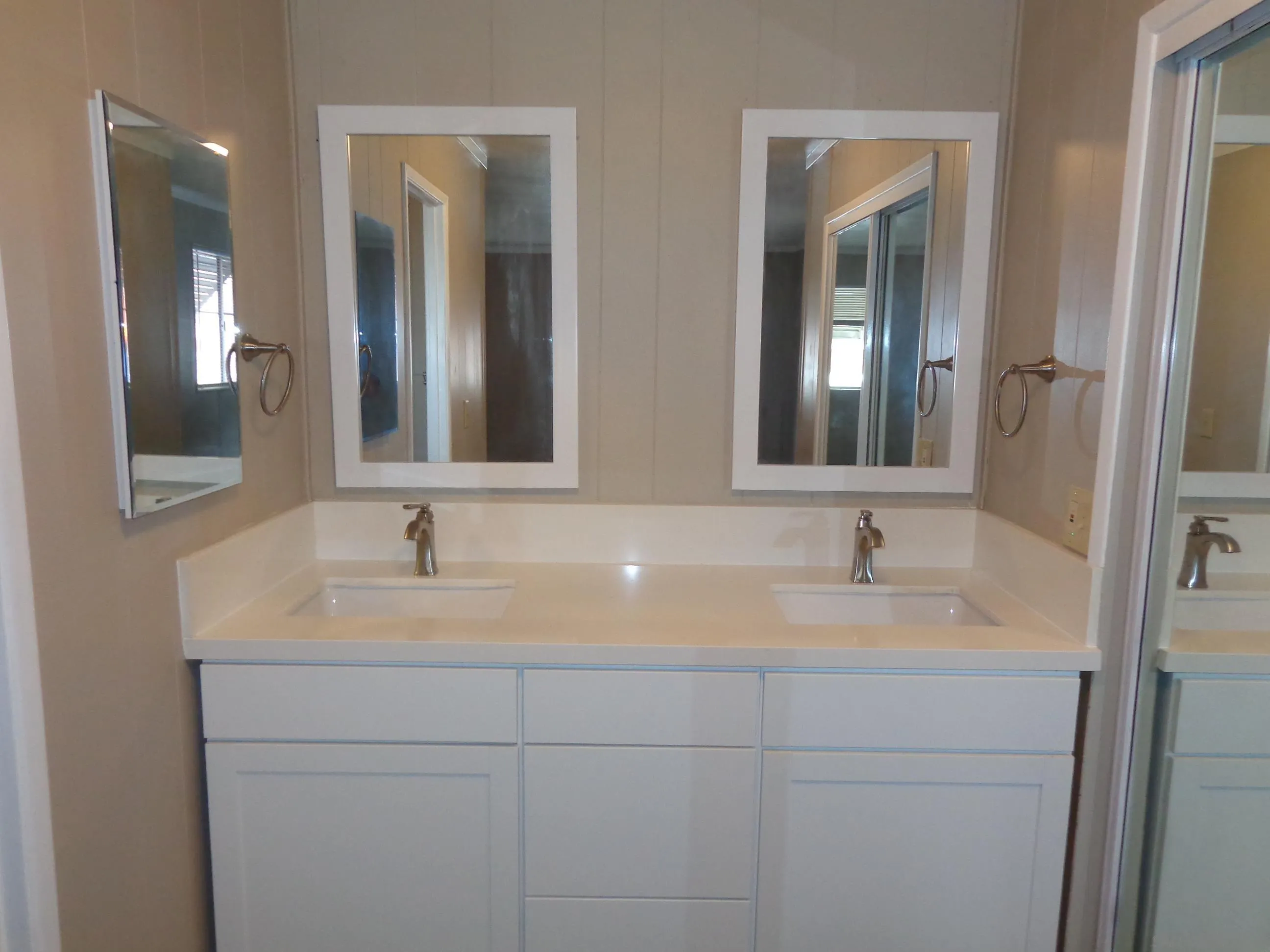 106 Havenview Lane Oceanside, CA 92056 - Photo 18 of 24 a bathroom with double sink and a mirror