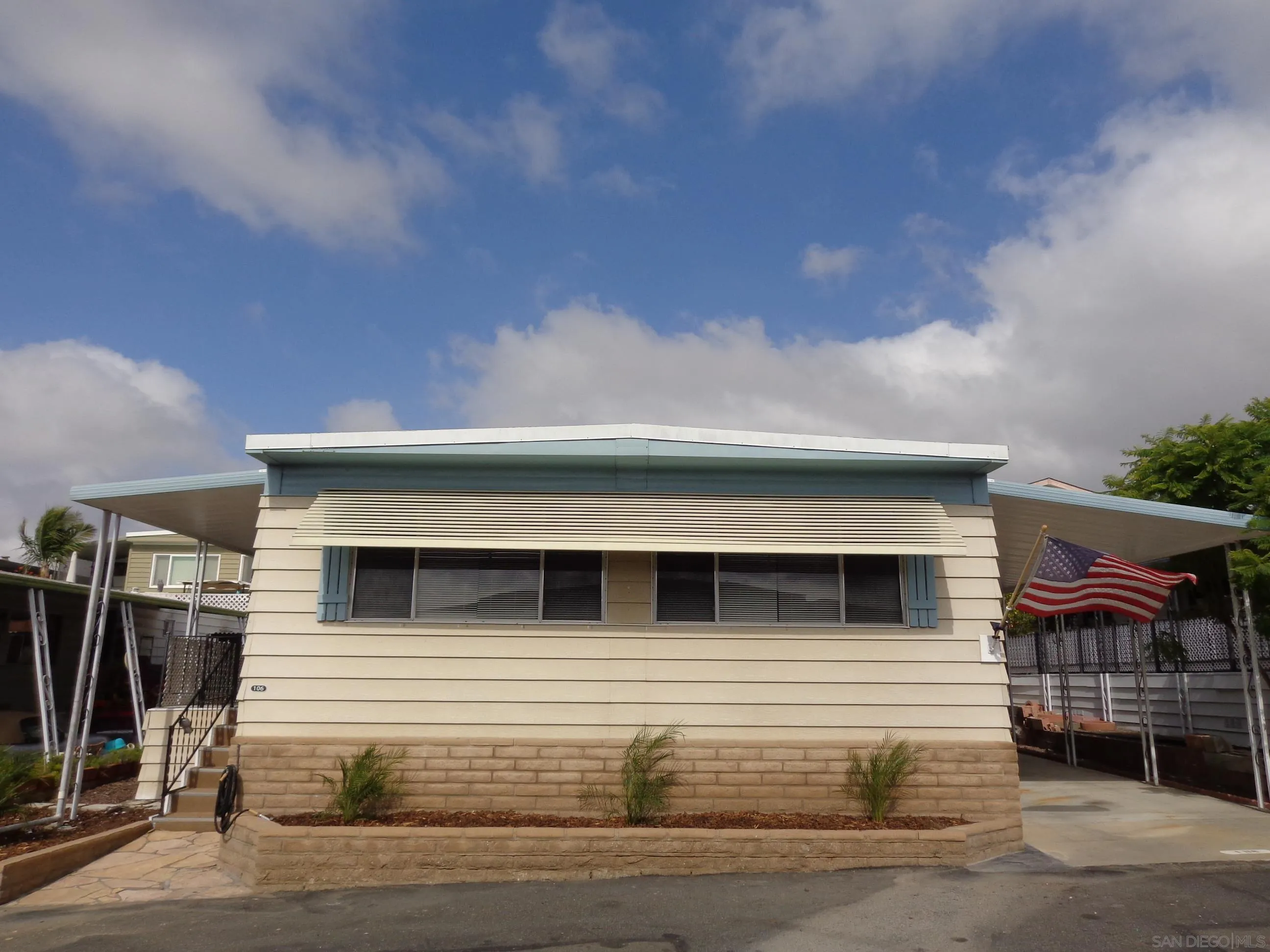 106 Havenview Lane Oceanside, CA 92056 - Photo 2 of 24 a front view of a house with a garage