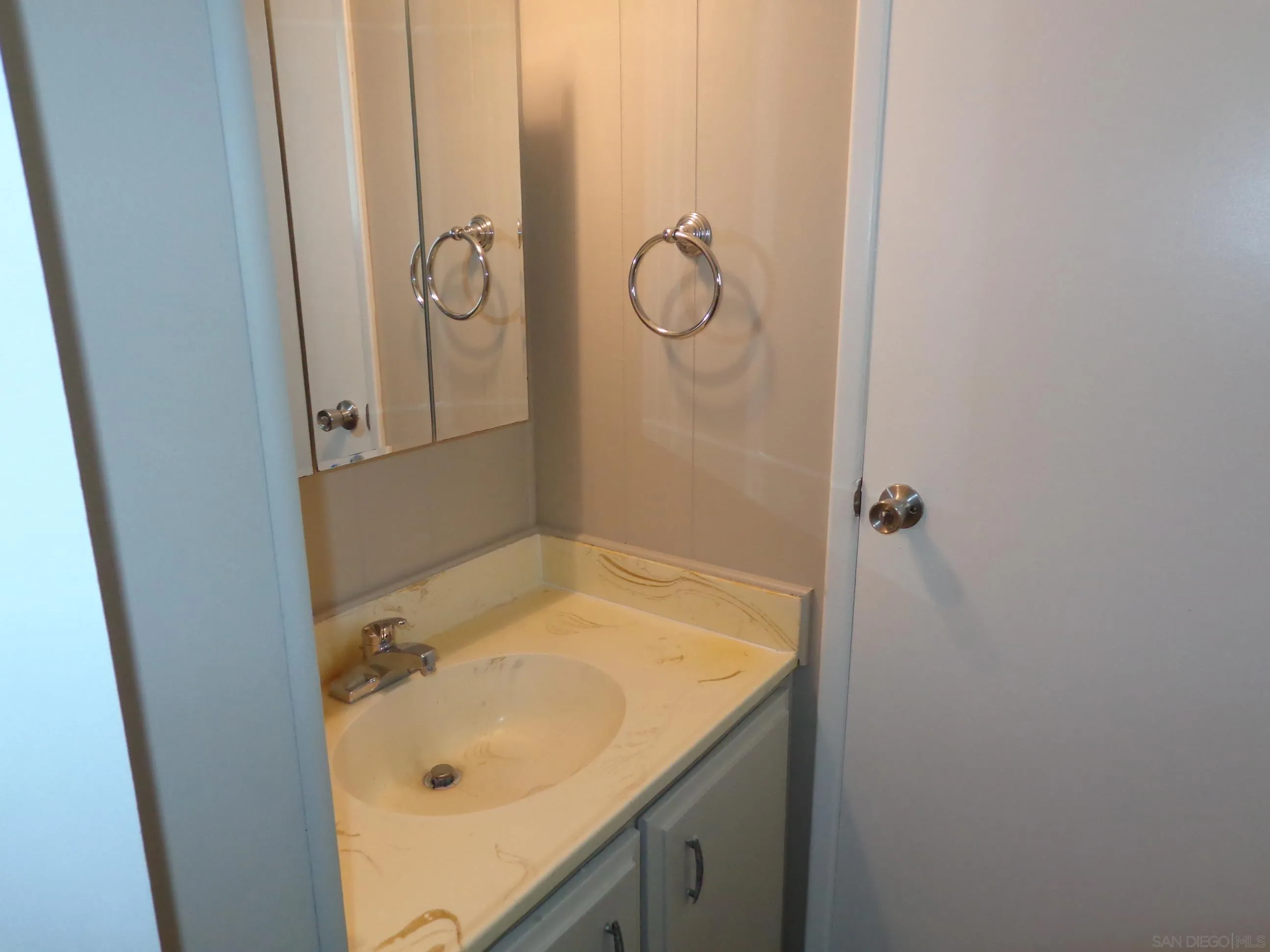 106 Havenview Lane Oceanside, CA 92056 - Photo 21 of 24 a bathroom with a granite countertop sink and shower