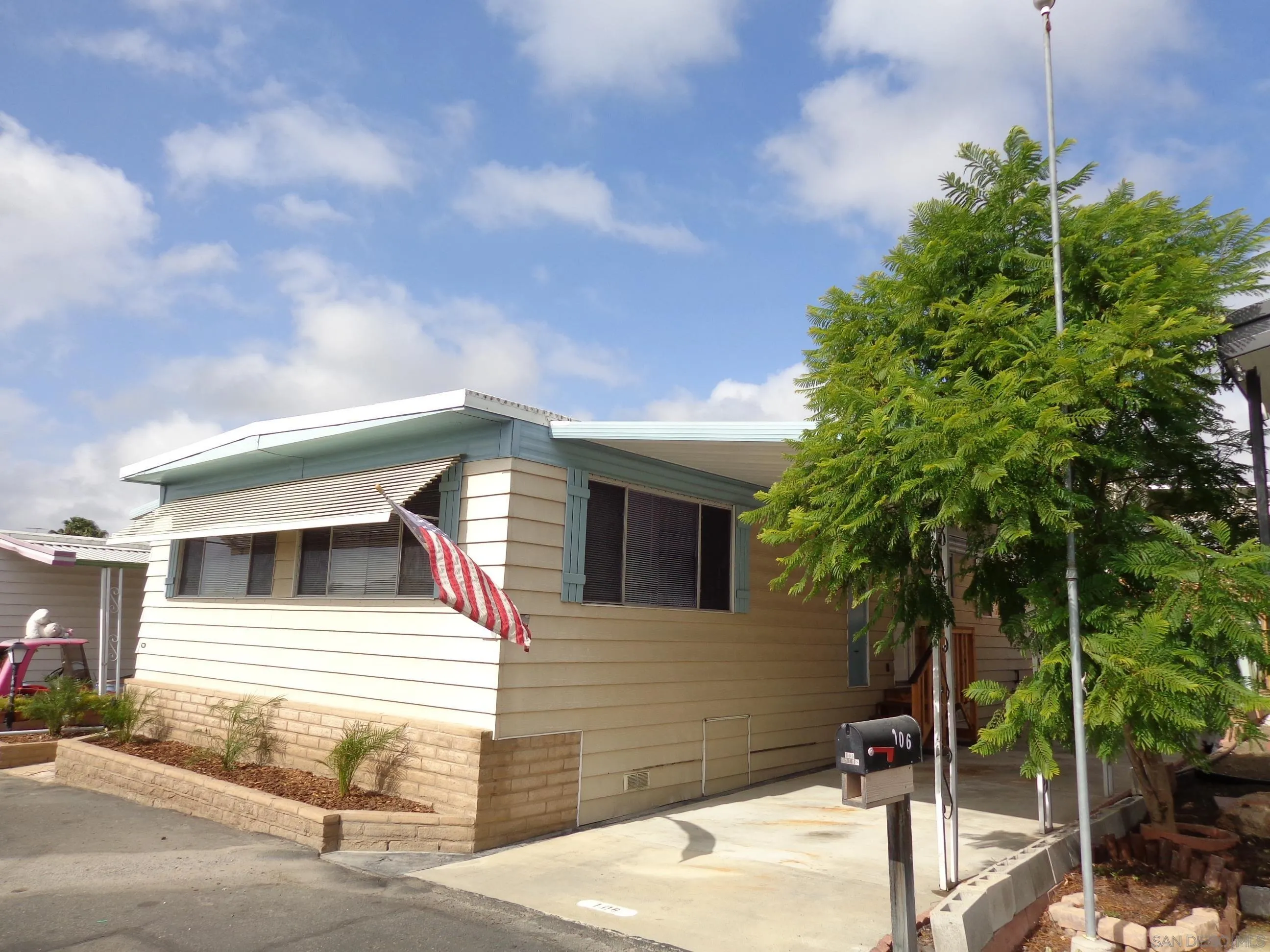 106 Havenview Lane Oceanside, CA 92056 - Photo 3 of 24 a front view of a house with garage