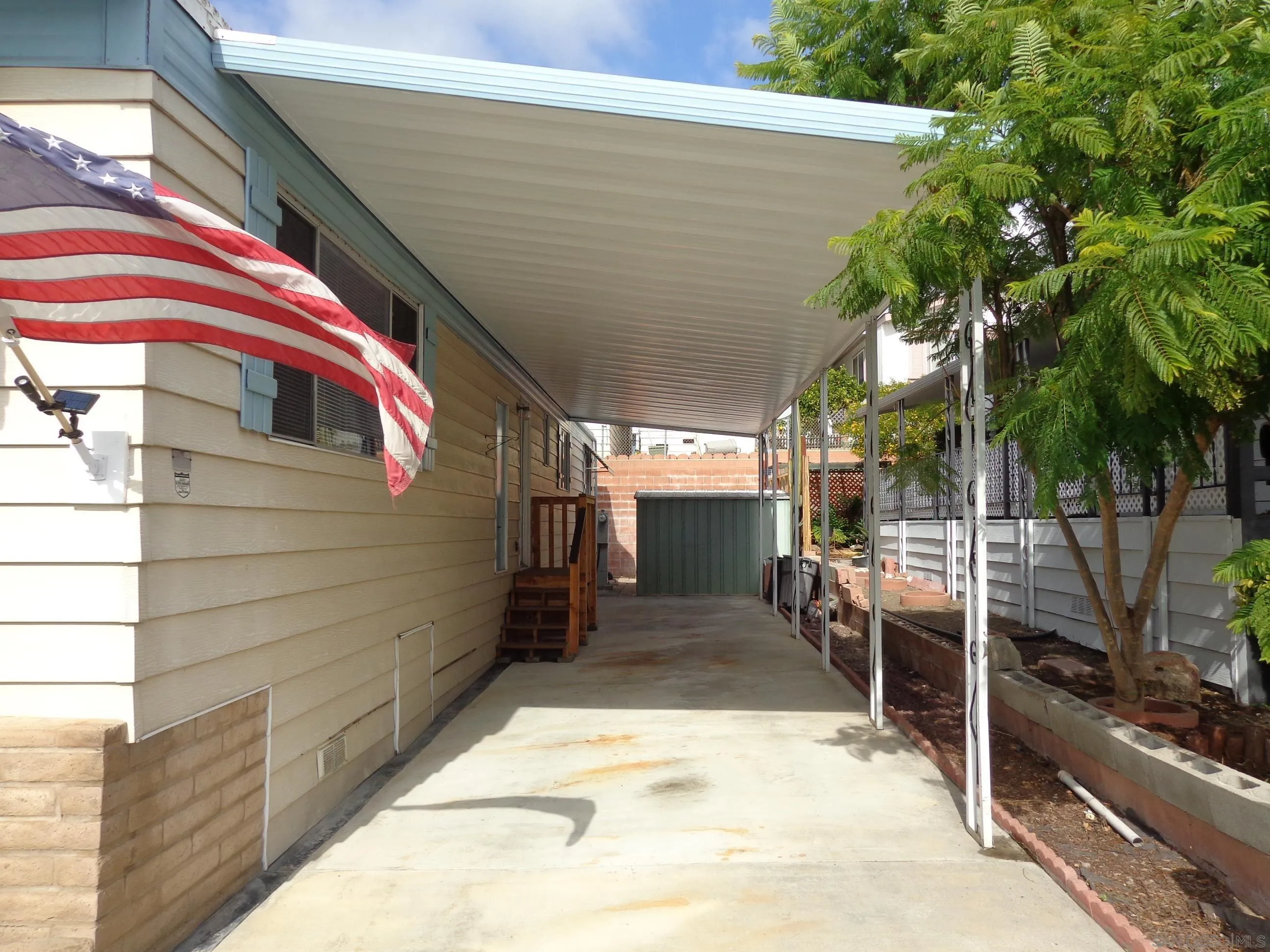 106 Havenview Lane Oceanside, CA 92056 - Photo 4 of 24 a view of a chairs with table in the patio