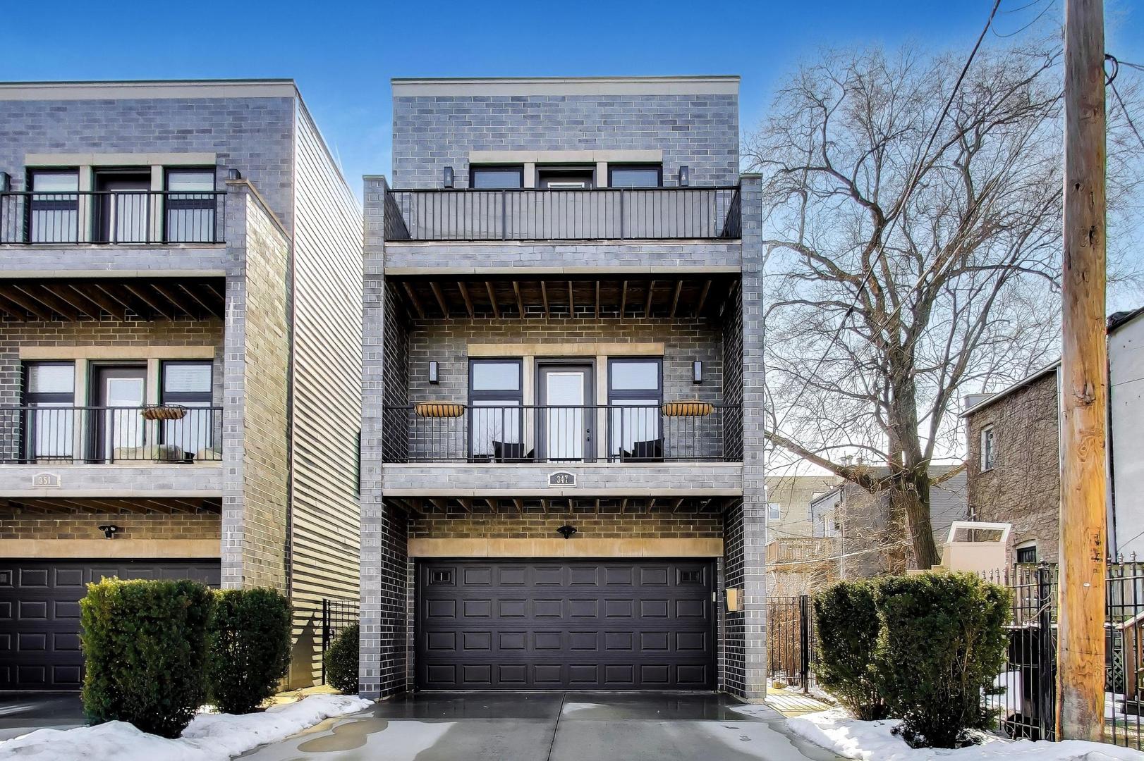a front view of a house with yard