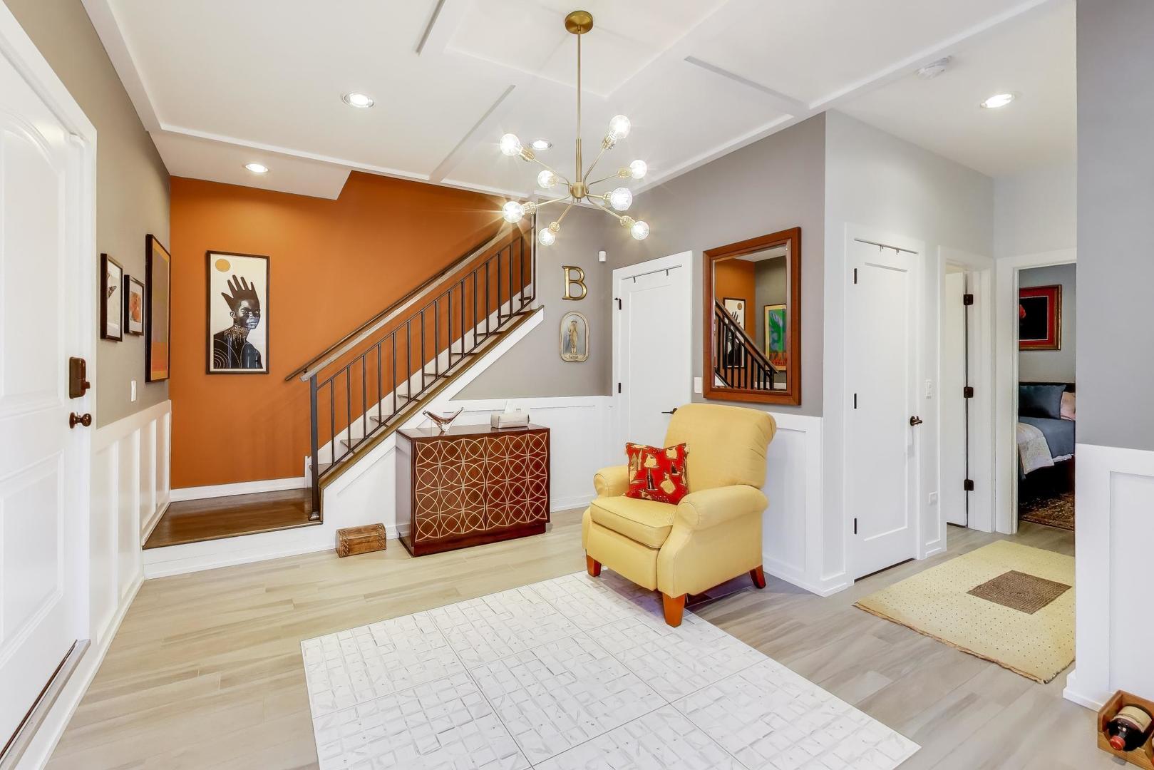 347 East 44th Street Chicago, IL 60653 - Photo 2 of 38 a living room with stairs