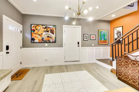 a view of an entryway with a workspace