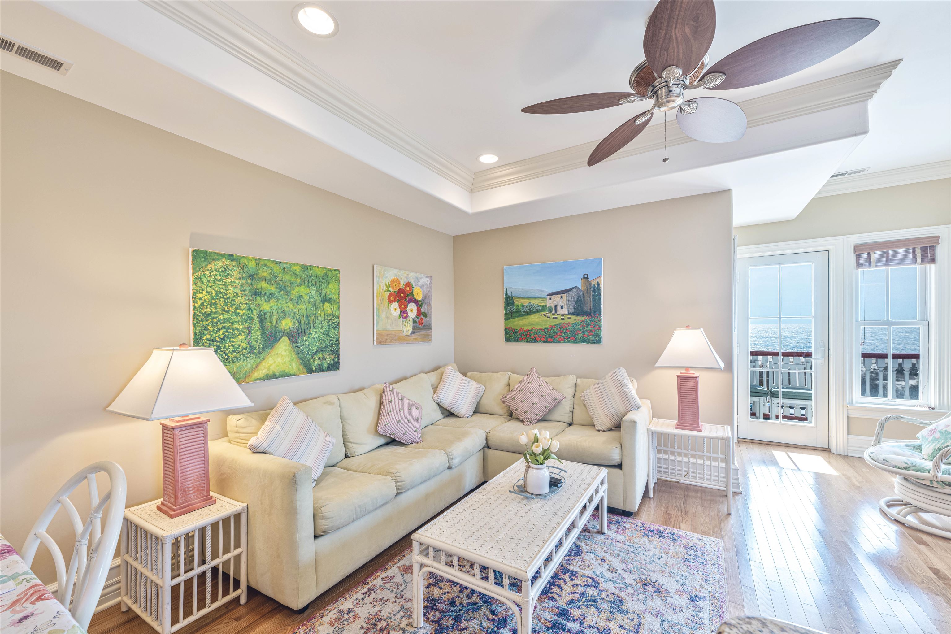 927 Beach, Unit 6 Cape May, NJ 08204 - Photo 11 of 34 a living room with furniture and a wooden floor
