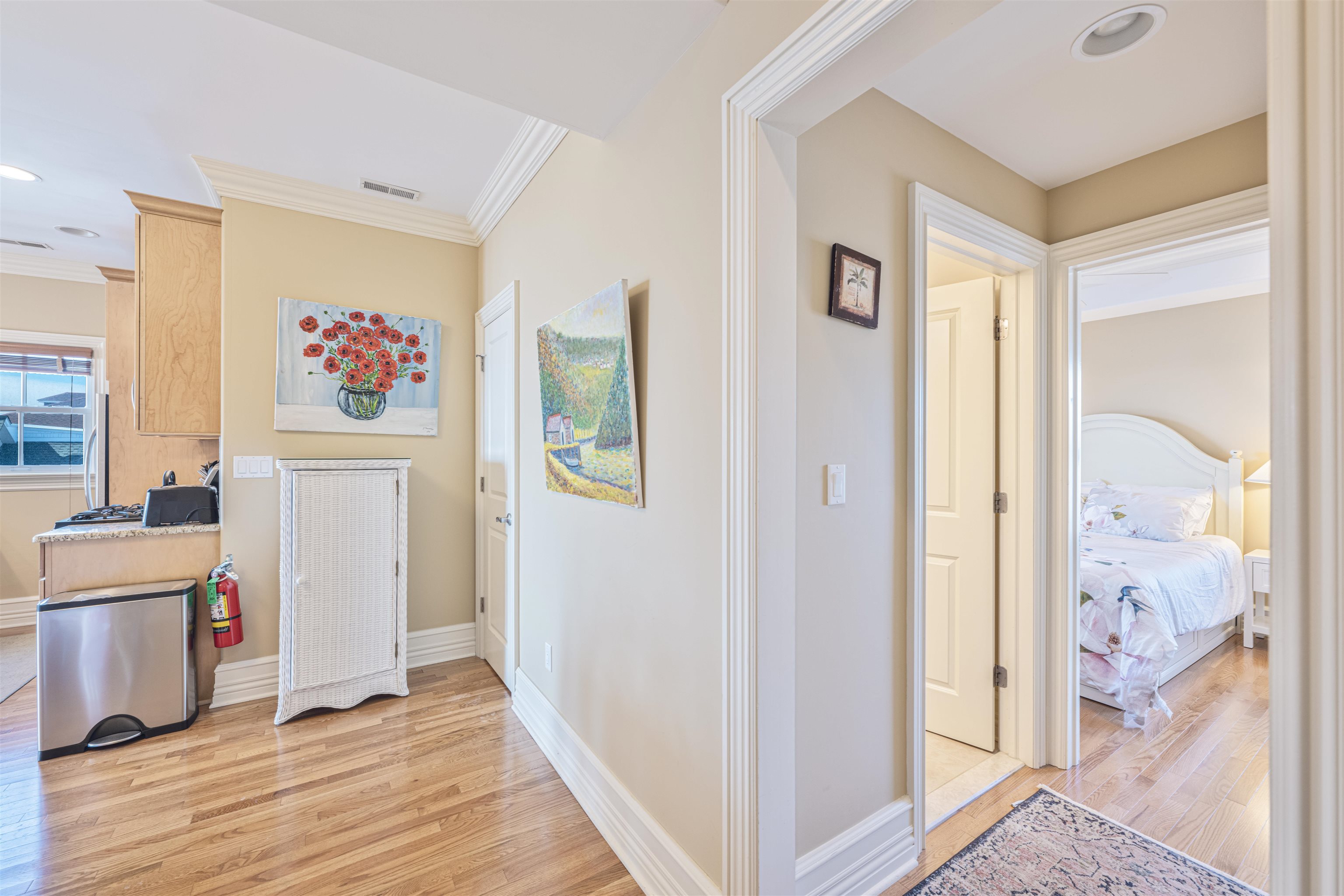 927 Beach, Unit 6 Cape May, NJ 08204 - Photo 3 of 34 a view of hallway with wooden floor and windows