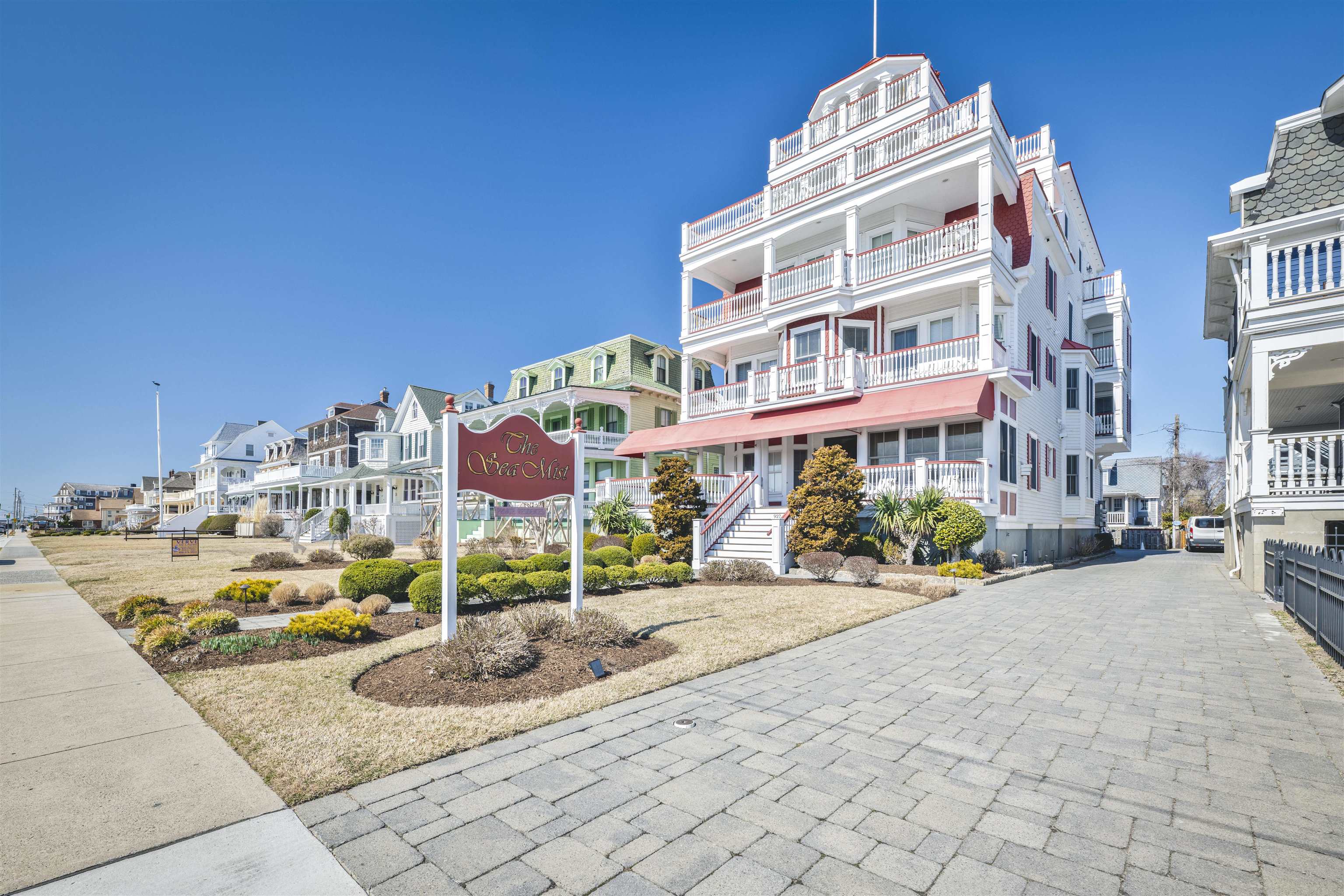 927 Beach, Unit 6 Cape May, NJ 08204 - Photo 31 of 34 a front view of a building with sitting area