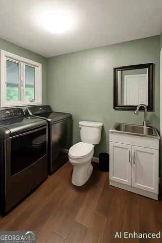 a kitchen with cabinets and a flat screen tv