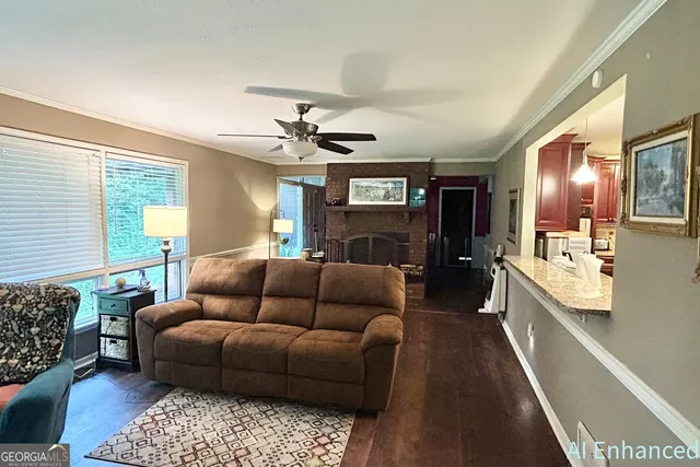 a view of a kitchen area with furniture and appliances