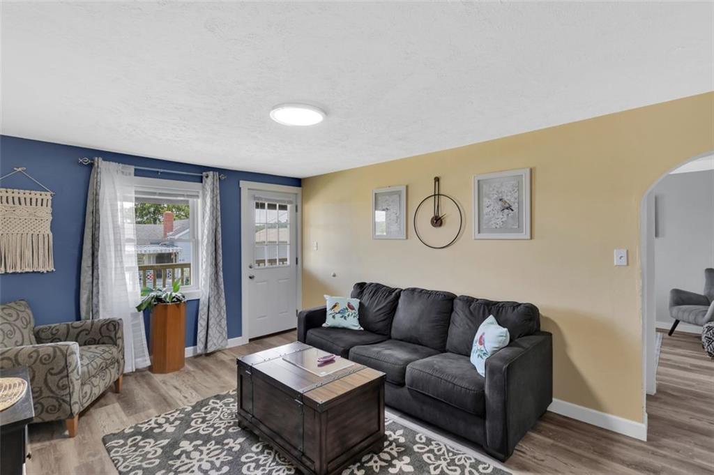 1646 Main Street Leechburg, PA 15656 - Photo 17 of 33 a living room with furniture and wooden floor