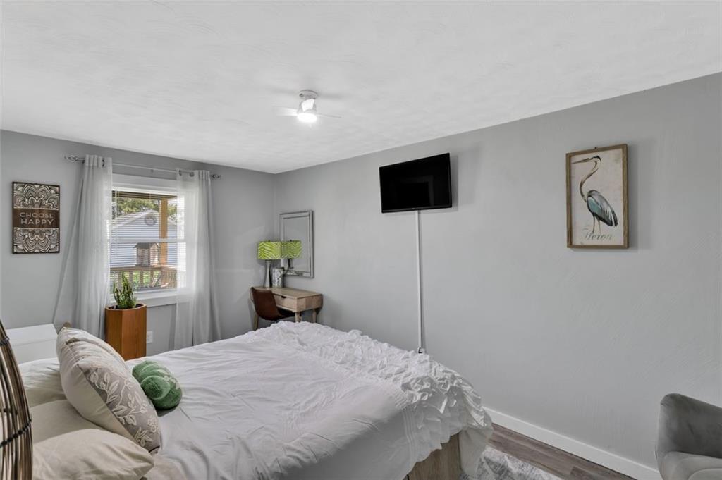 1646 Main Street Leechburg, PA 15656 - Photo 18 of 33 a bedroom with a bed and a flat screen tv