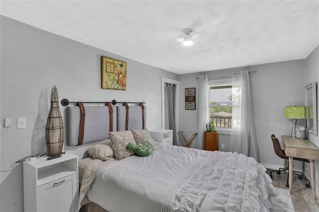 1646 Main Street Leechburg, PA 15656 - Photo 20 of 33 a bed room with a bed and a chair