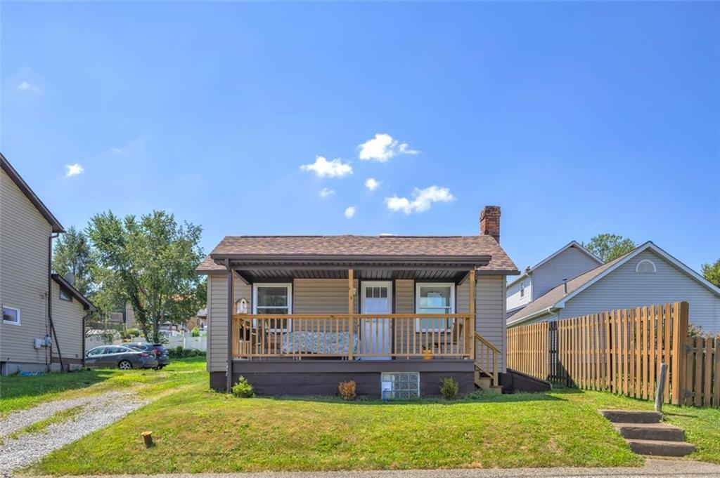 1646 Main Street Leechburg, PA 15656 - Photo 2 of 33 a front view of a house with a yard
