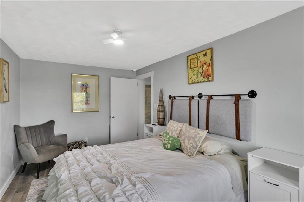 1646 Main Street Leechburg, PA 15656 - Photo 21 of 33 a bedroom with a bed and a chair