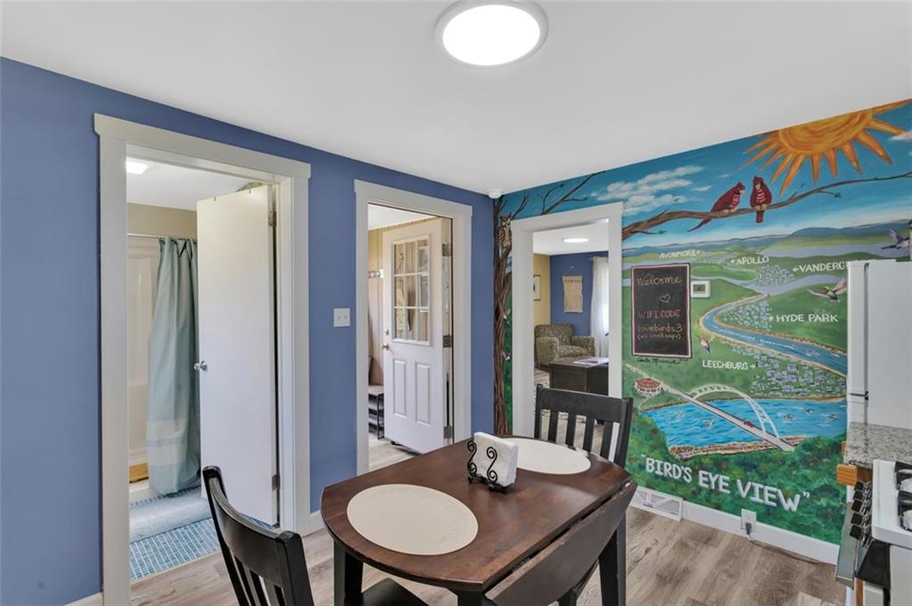 1646 Main Street Leechburg, PA 15656 - Photo 25 of 33 a view of a dining room with furniture window and wooden floor