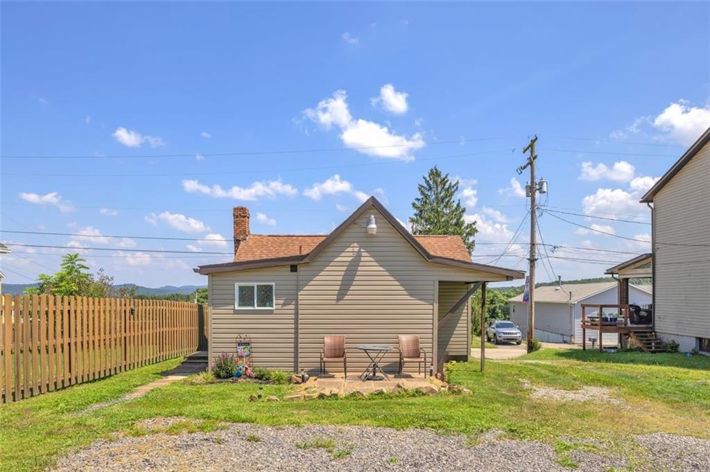1646 Main Street Leechburg, PA 15656 - Photo 6 of 33 a backyard of a house with table and chairs