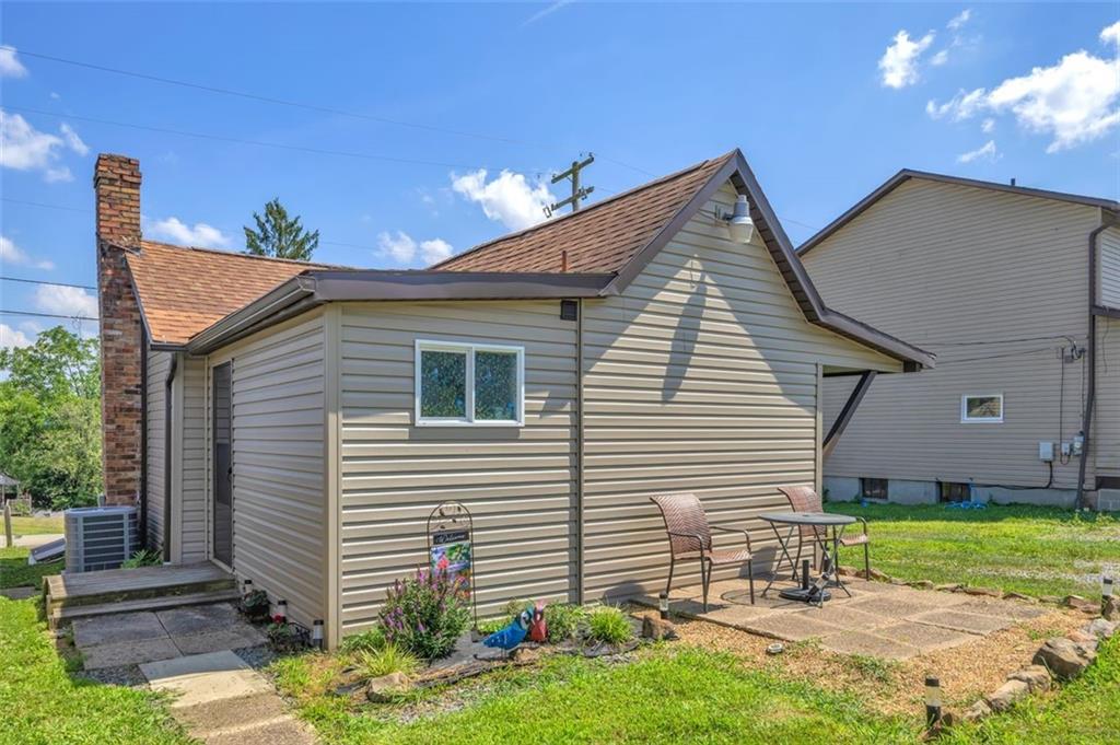 1646 Main Street Leechburg, PA 15656 - Photo 8 of 33 a view of backyard with a garden and plants
