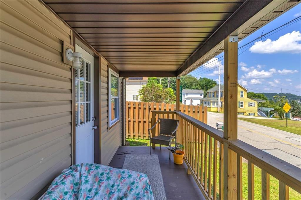 1646 Main Street Leechburg, PA 15656 - Photo 10 of 33 a view of a porch with wooden floor