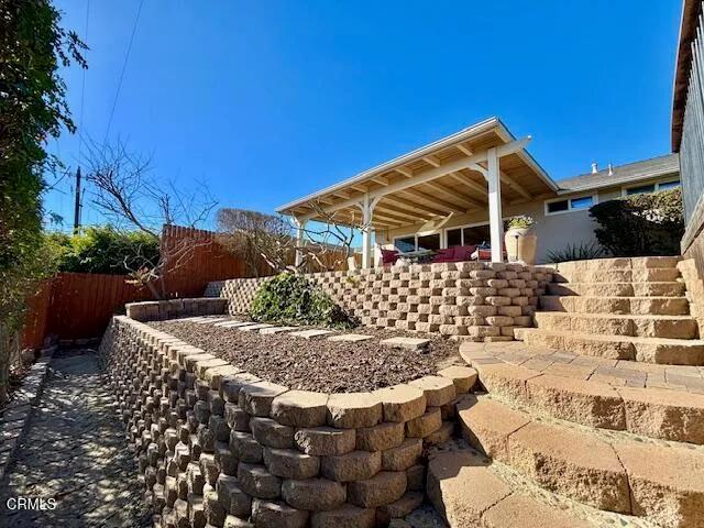 a view of a backyard with plants