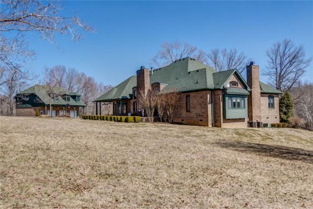 7757 Smith Road Primm Springs, TN 38476 - Photo 8 of 20 Beautiful home and detached garage, aggregate drive.