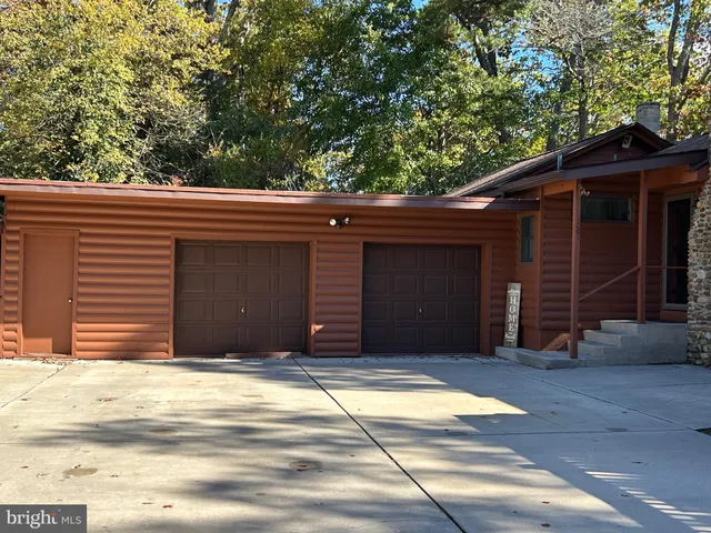 a view of a house with a garage