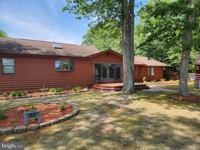 a view of house with outdoor space
