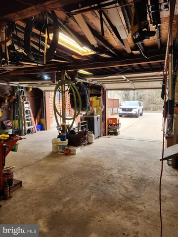 a view of water heater room with gym equipment