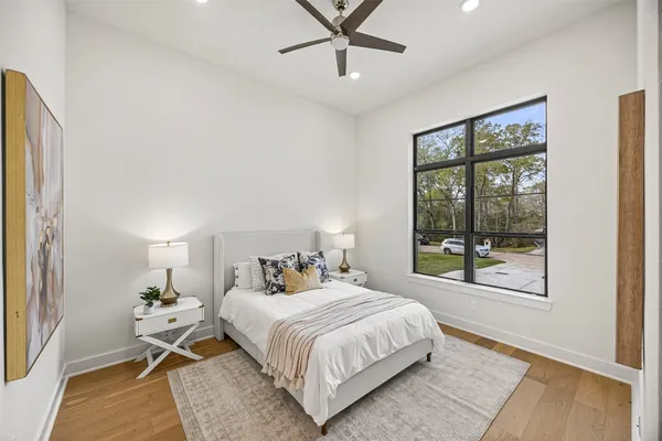 a living room with furniture and flowers