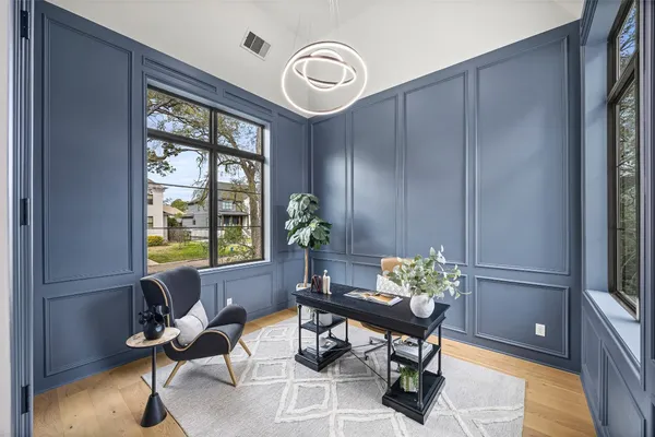 a workspace with furniture and window