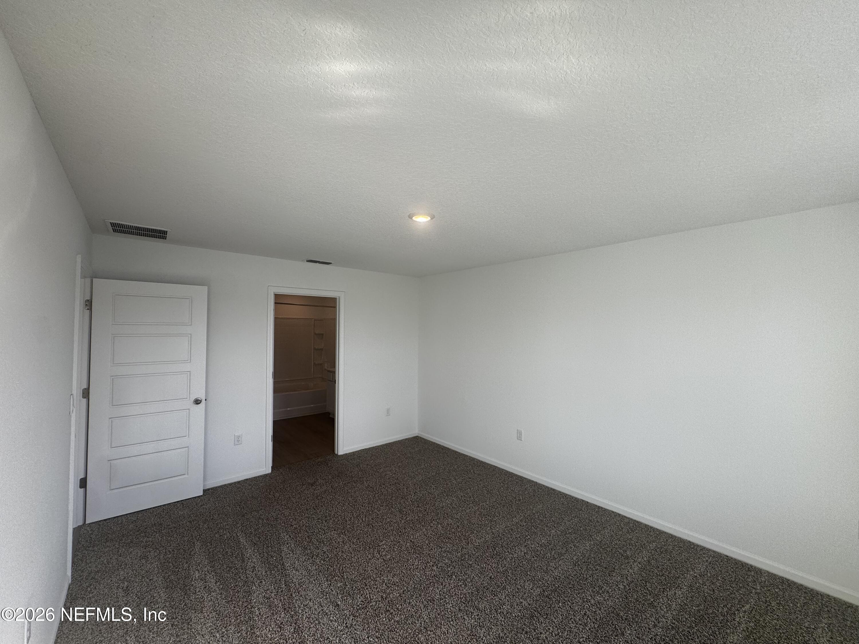 12390 Russian Olive Road Jacksonville, FL 32218 - Photo 18 of 67 wooden floor in an empty room