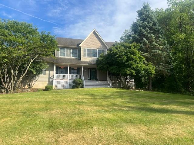 13 Meadow Ridge Road Warwick, NY 10990 - Photo 1 of 1 a view of a house with a backyard