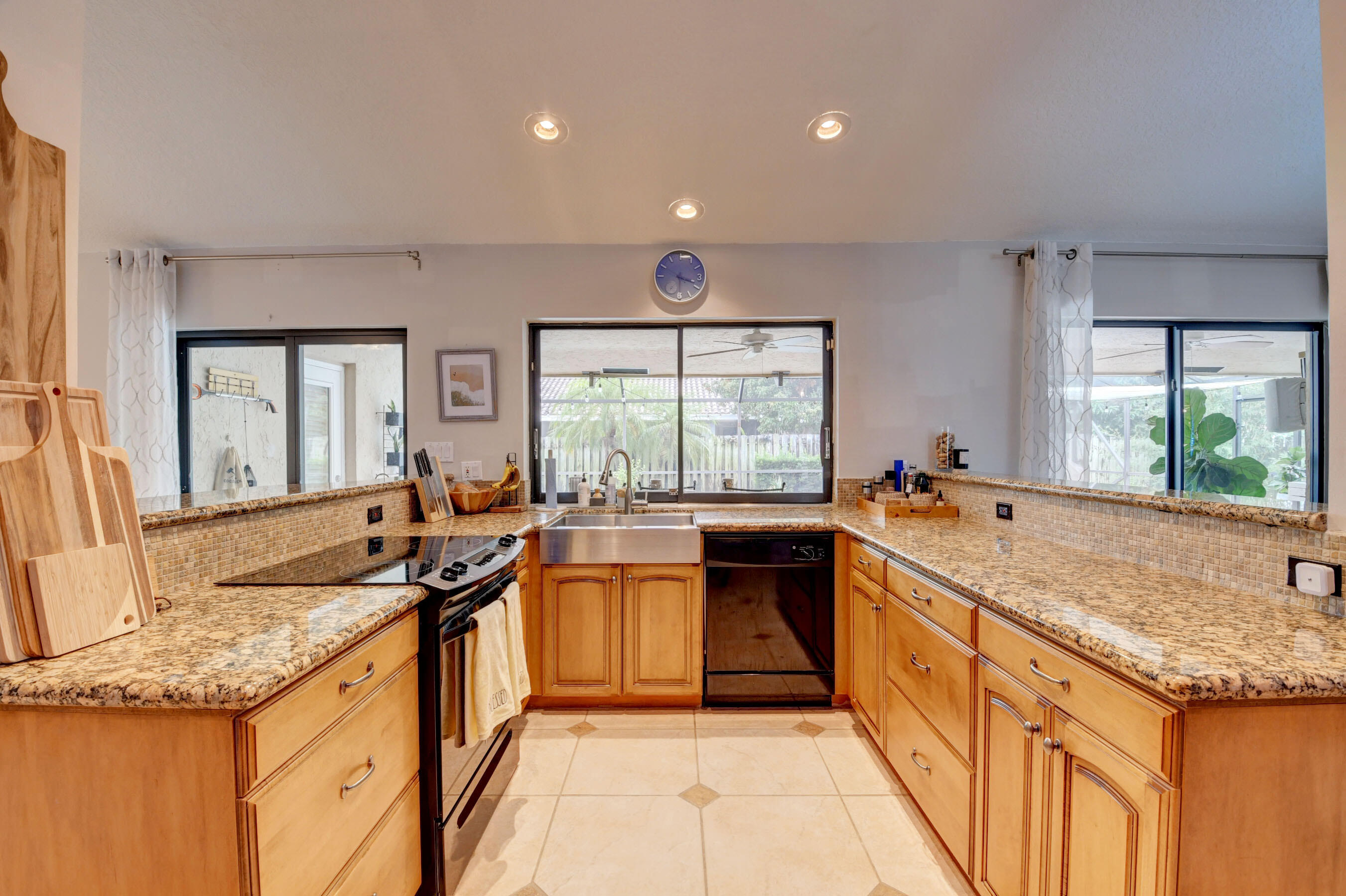 454 Sequoia Lane Boca Raton, FL 33487 - Photo 15 of 35 Kitchen view to pool area