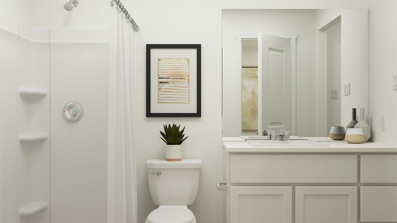 950 Pertuso Lane Huffman, TX 77336 - Photo 13 of 18 a bathroom with a sink toilet and mirror