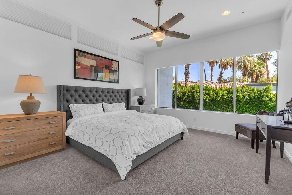 350 Goleta Way Palm Springs, CA 92264 - Photo 29 of 60 a bedroom with a large bed and a window
