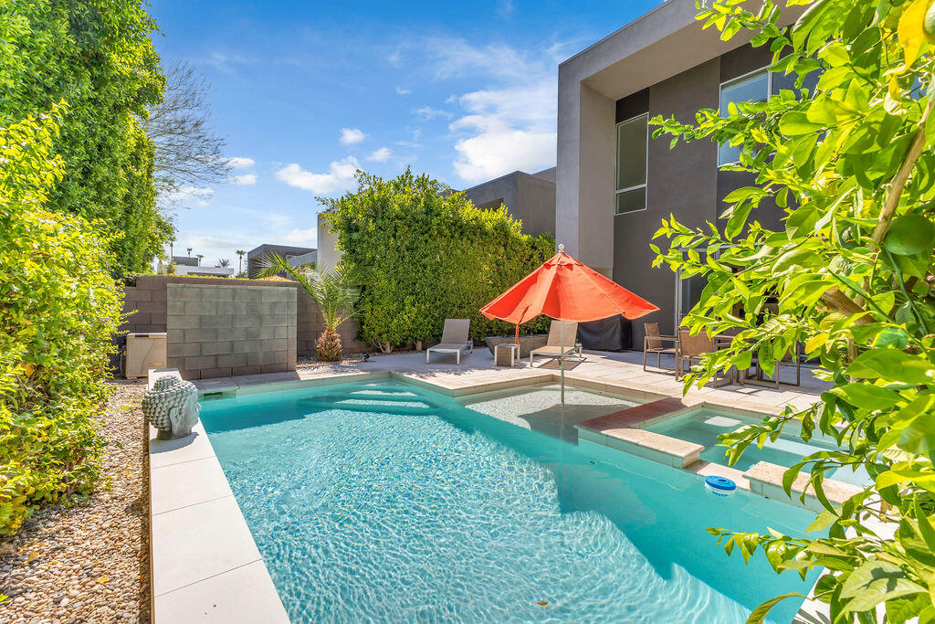 350 Goleta Way Palm Springs, CA 92264 - Photo 45 of 60 a view of a backyard with potted plants