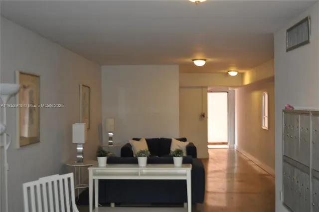 a living room with furniture and a table