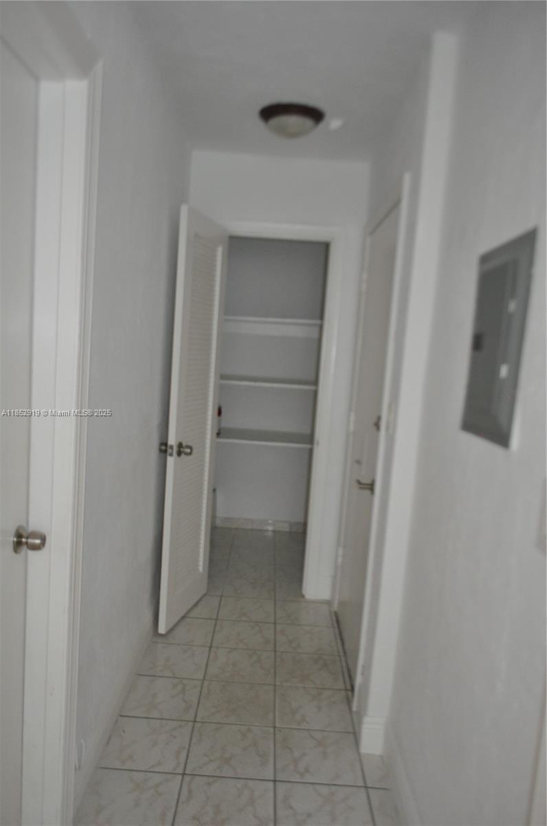251 Galen Drive, Unit 204E Key Biscayne, FL 33149 - Photo 5 of 16 a view of closet area
