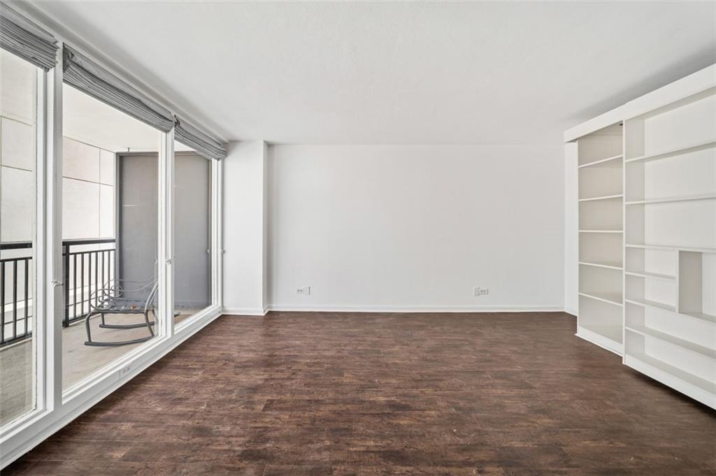 620 Peachtree Street Northeast, Unit 1716 Atlanta, GA 30308 - Photo 11 of 37 an empty room with windows